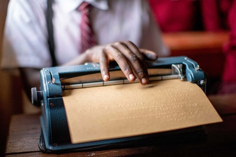 A-visually-impaired-student-uses-a-brailler-in-class-in-gulu-Uganda