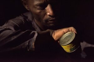 AN-upcycler-checks-if-the-lamps-he-just-made-has-no-holes-in-kampala-uganda-1